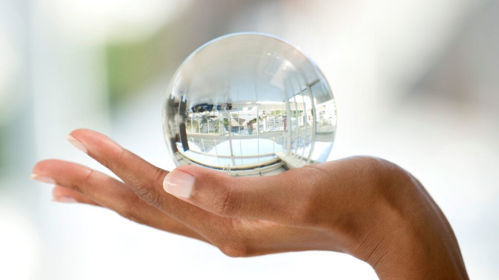 Crystal ball on hand
